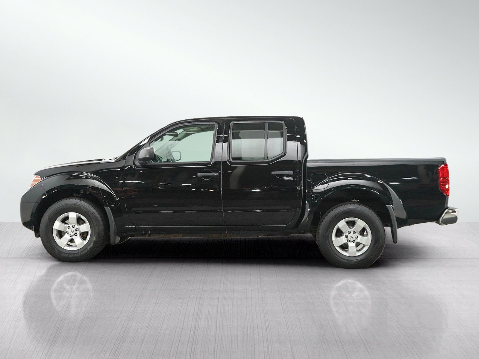 Used 2012 Super Black Metallic Nissan SV image 2