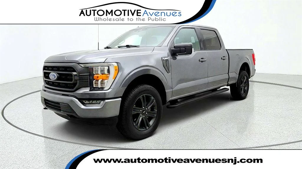 Used 2023 Carbonized Gray Metallic Ford XLT 4WD SuperCrew 6.5