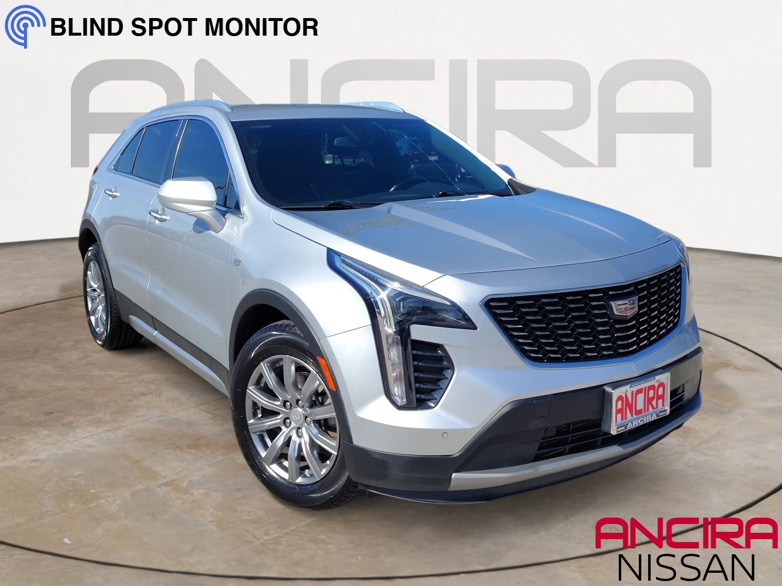 Used 2019 Radiant Silver Metallic Cadillac FWD Premium Luxury image 1