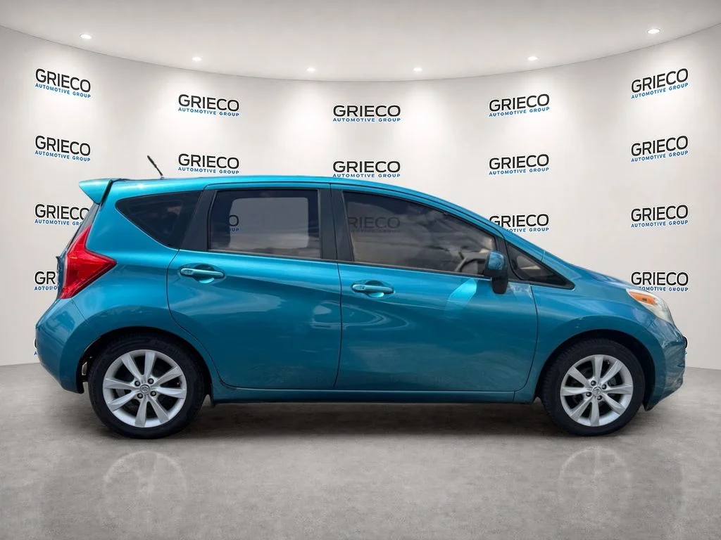 Used 2014 Metallic Peacock Nissan SV image 8