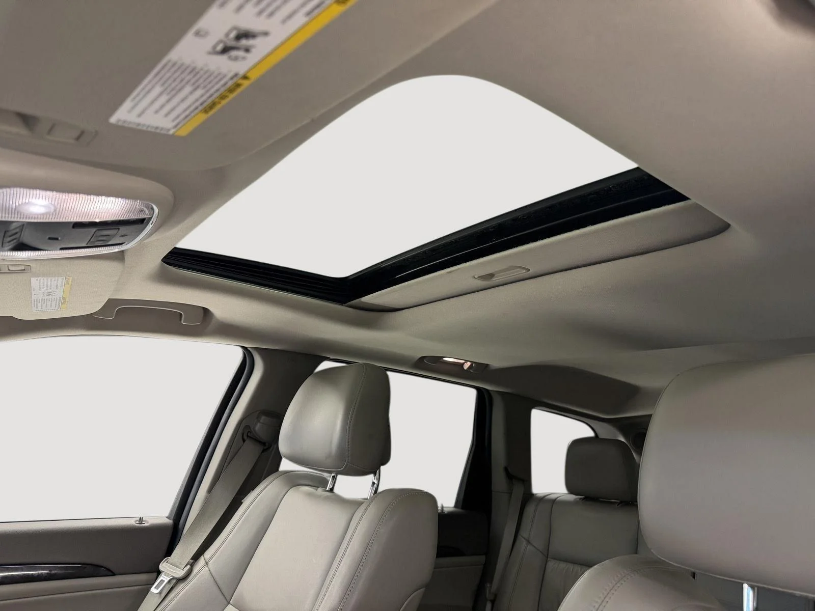 Used 2011 Dark Charcoal Pearl Jeep Laredo image 4