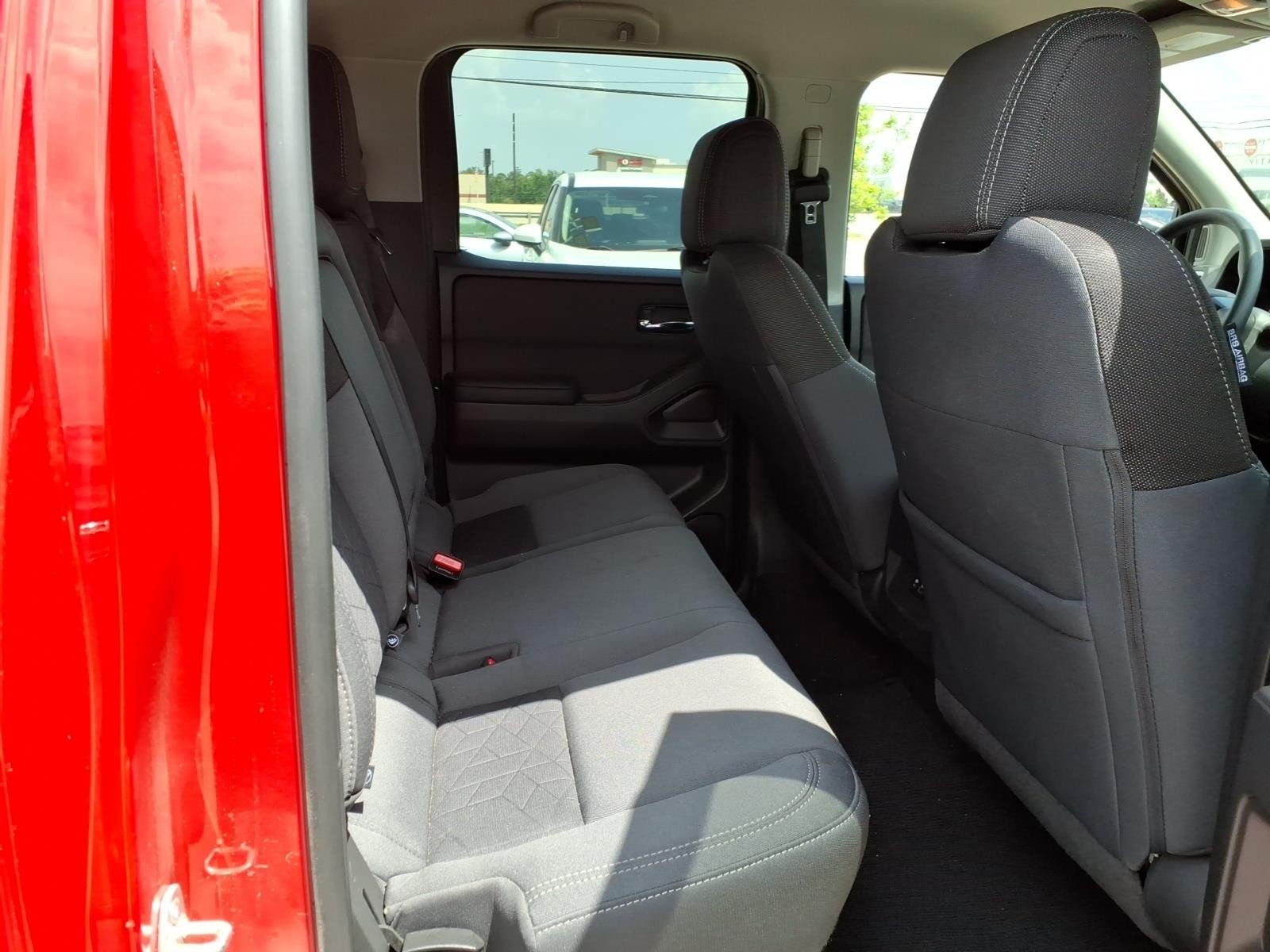 2026 Nissan Frontier SV Red at Robbins Nissan
