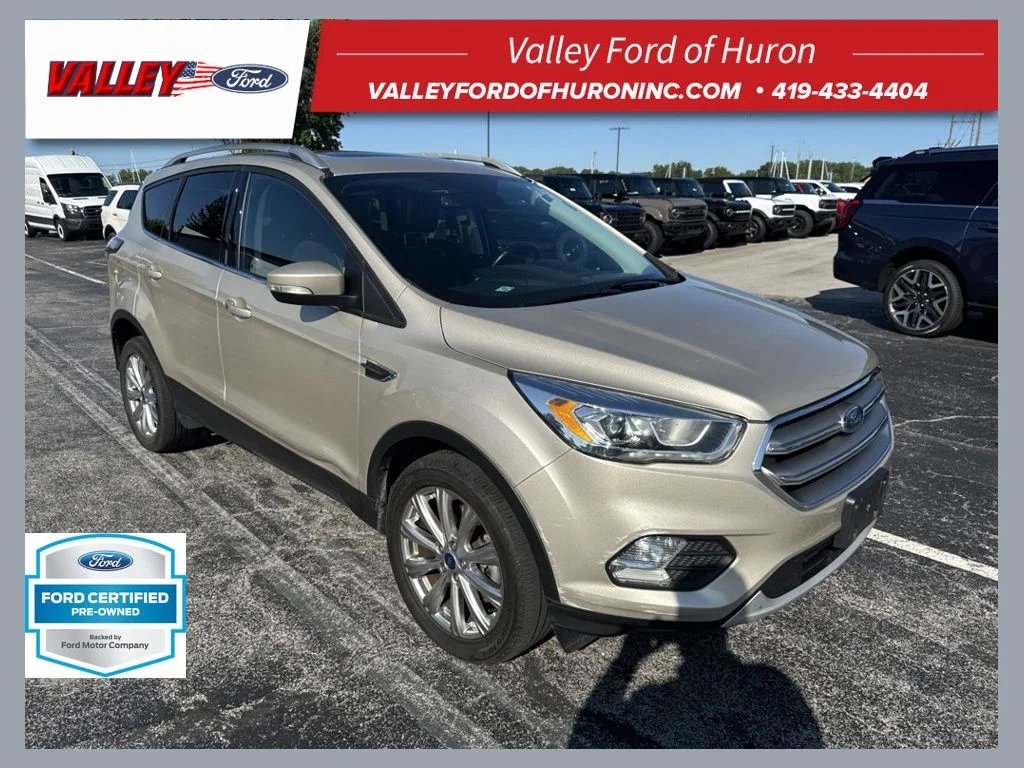 Used 2017 Gold Ford Titanium image 1