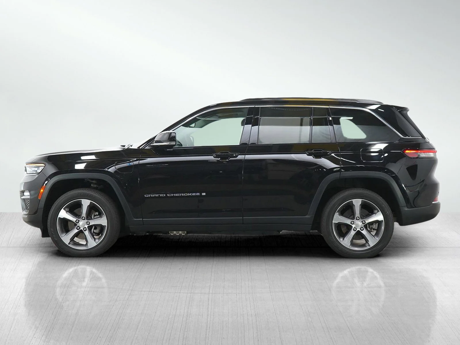Used 2023 Jeep Grand Cherokee 4xe with VIN 1C4RJYB66PC588791 for sale in Hopkins, Minnesota