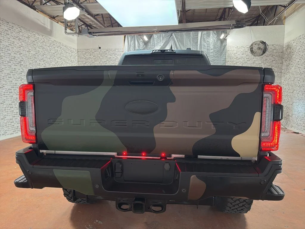 Used 2023 White Metallic / Camo Wrap Ford Lariat image 6