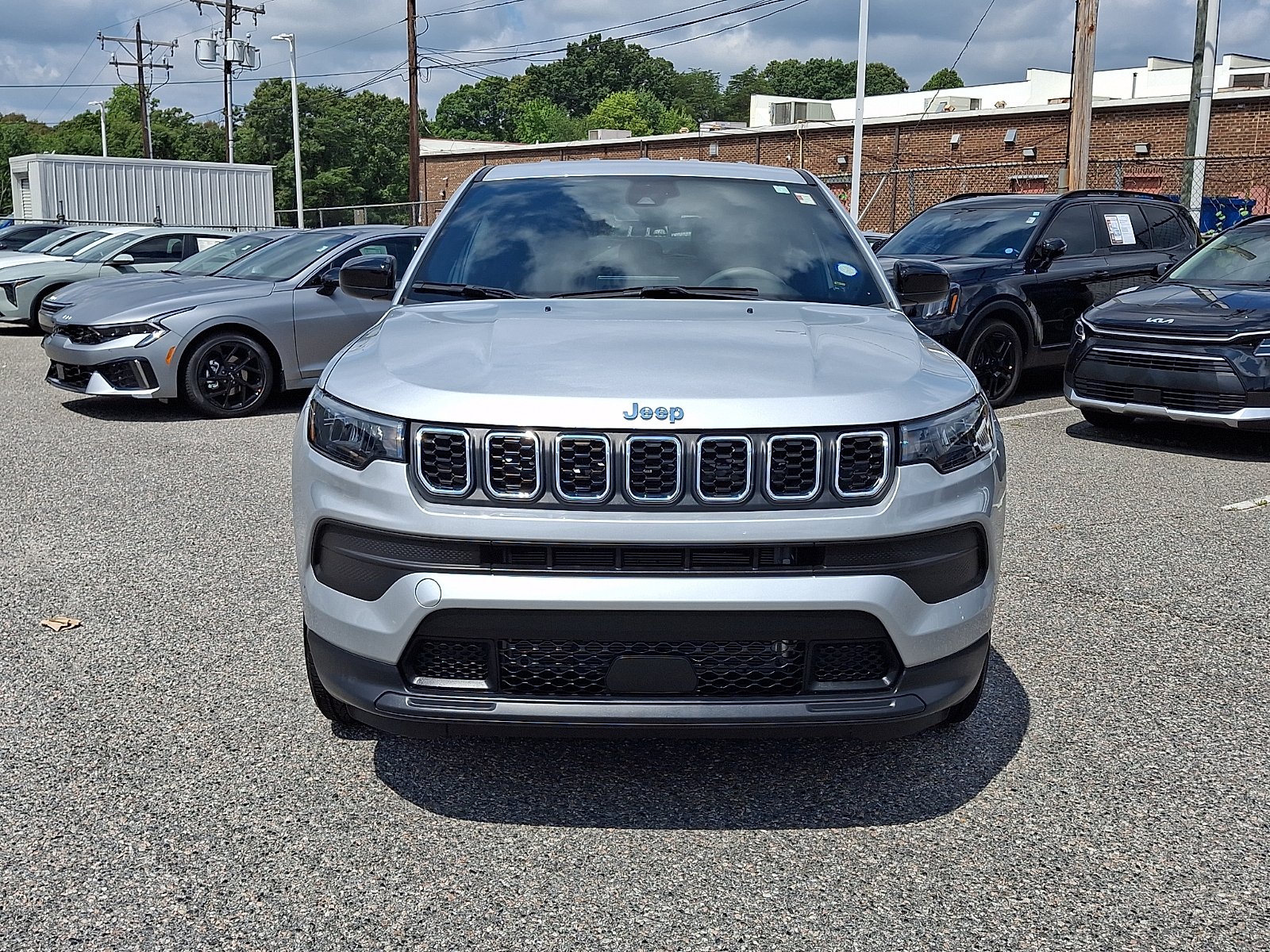 Used 2024 Silver Zynith Metallic Clearcoat Jeep Sport image 2