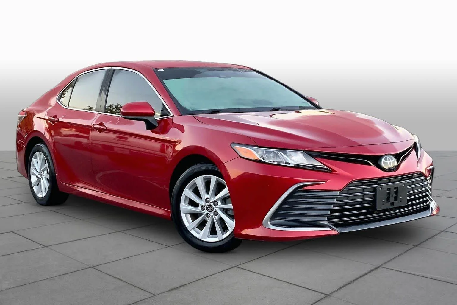 Used 2023 Supersonic Red Toyota LE image 3