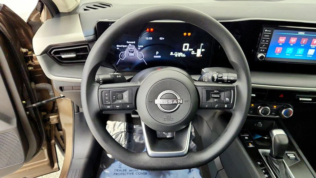 Used 2025 Canyon Bronze Metallic Nissan S FWD image 13
