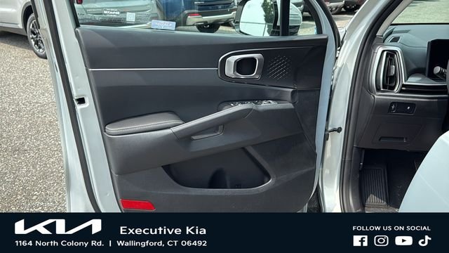New 2026 Ivory Silver Kia LX image 9