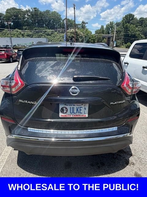 Used 2017 Magnetic Black Nissan Platinum image 3