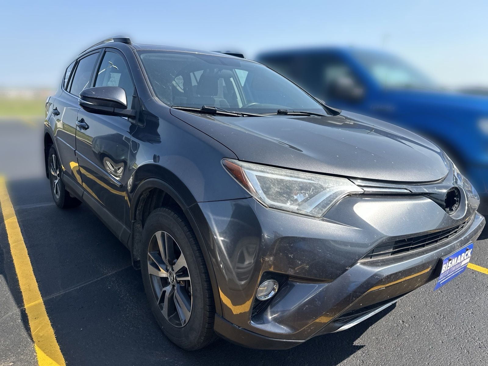Used 2016 Toyota RAV4 XLE with VIN 2T3RFREV9GW512375 for sale in Mandan, ND