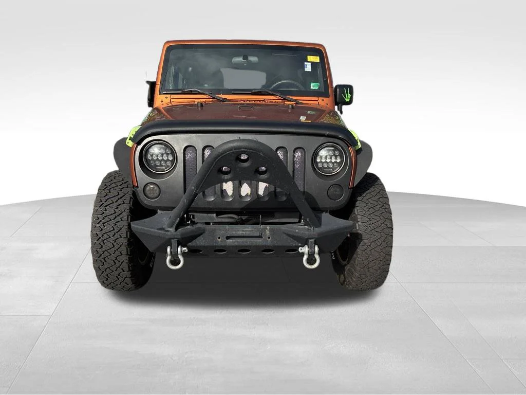 Used 2010 Orange Jeep Unlimited Sport image 2