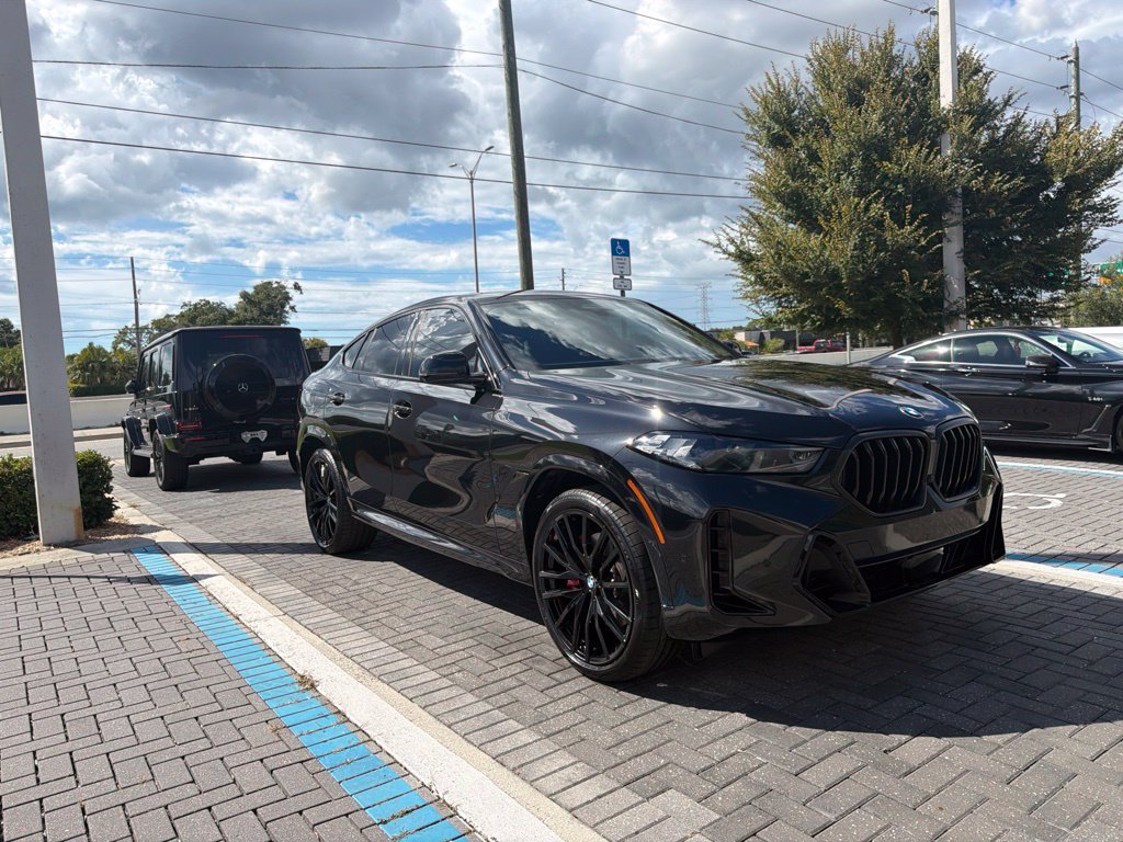 Used 2026 Black BMW xDrive40i image 1