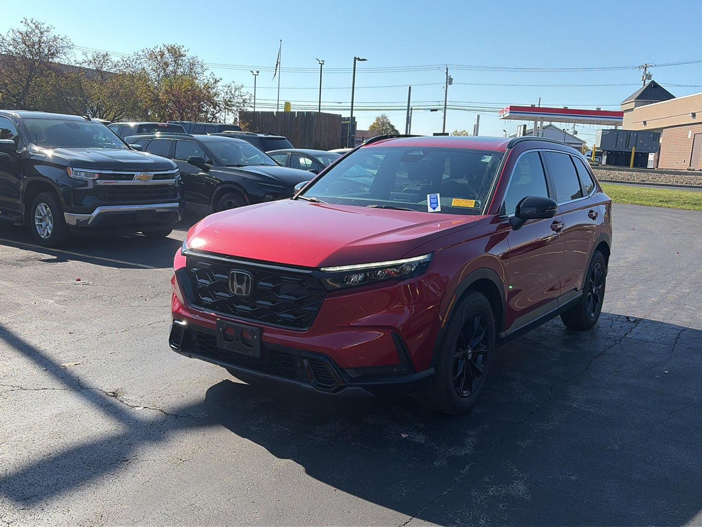 Used 2024 Radiant Red Metallic Honda Sport-L image 3