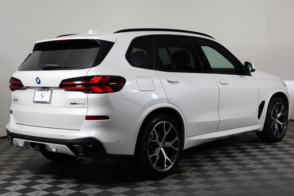 New 2026 Mineral White Metallic BMW xDrive50e image 2