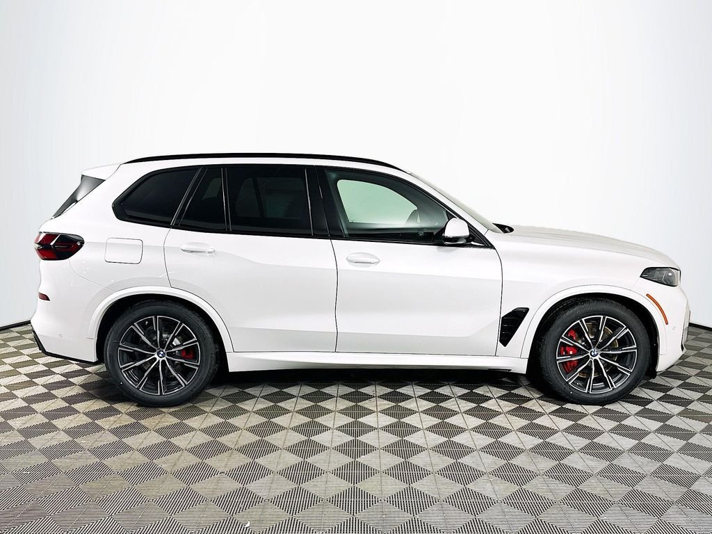 Used 2026 White Metallic BMW xDrive50e image 4