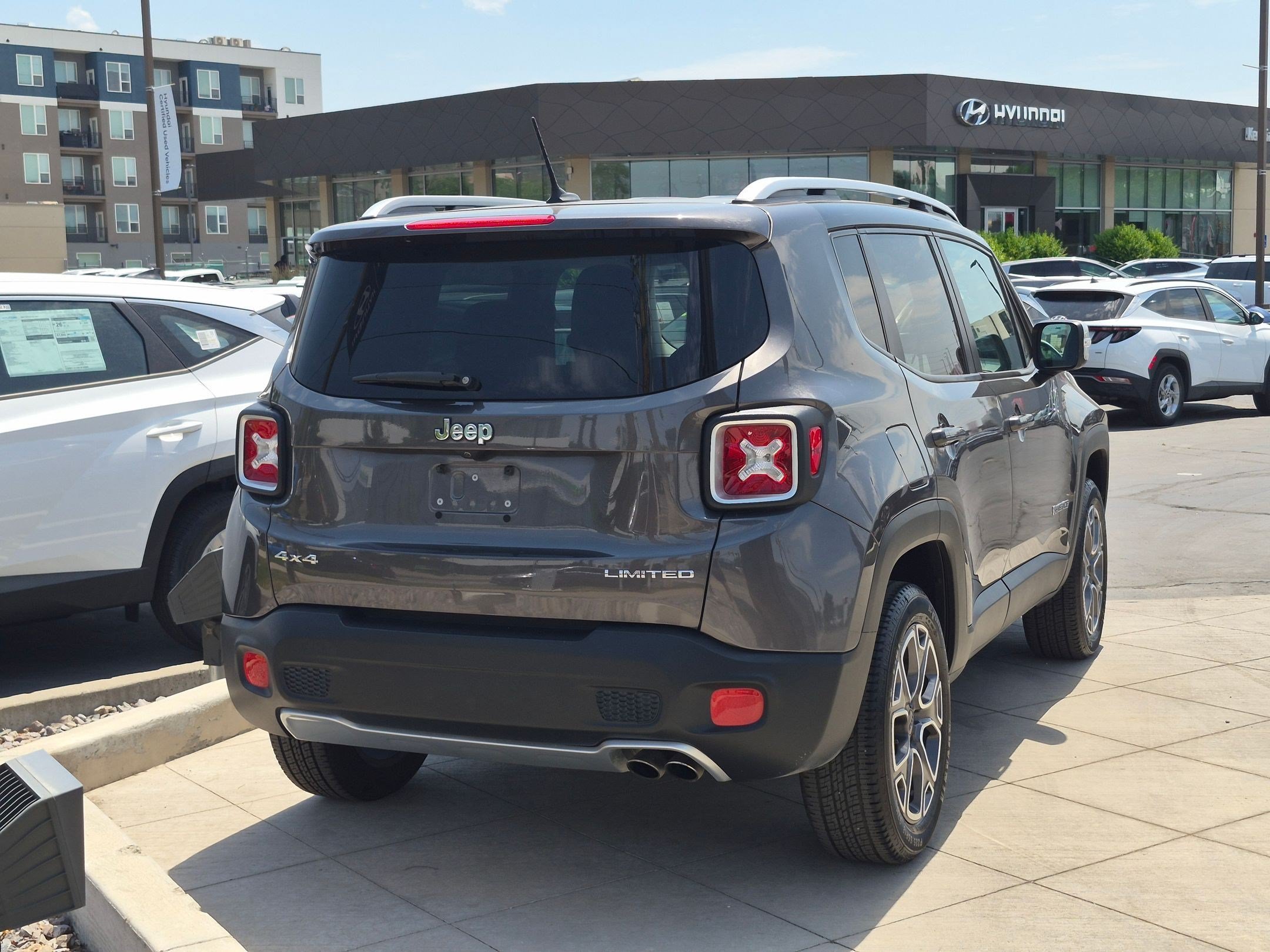Used 2017 Granite Crystal Metallic Clearcoat Jeep Limited image 3