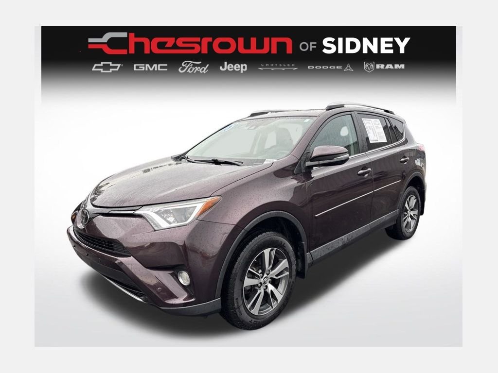 Used 2018 Black Currant Metallic Toyota XLE image 1