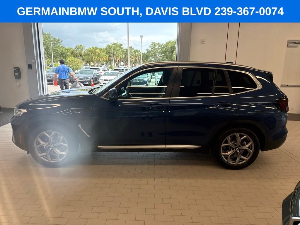 Certified Used 2022 Blue Metallic BMW sDrive30i image 2