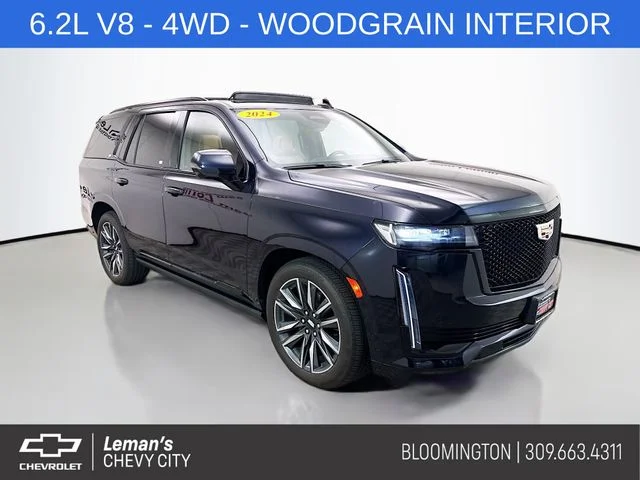 Used 2024 Blue Cadillac Sport image 1