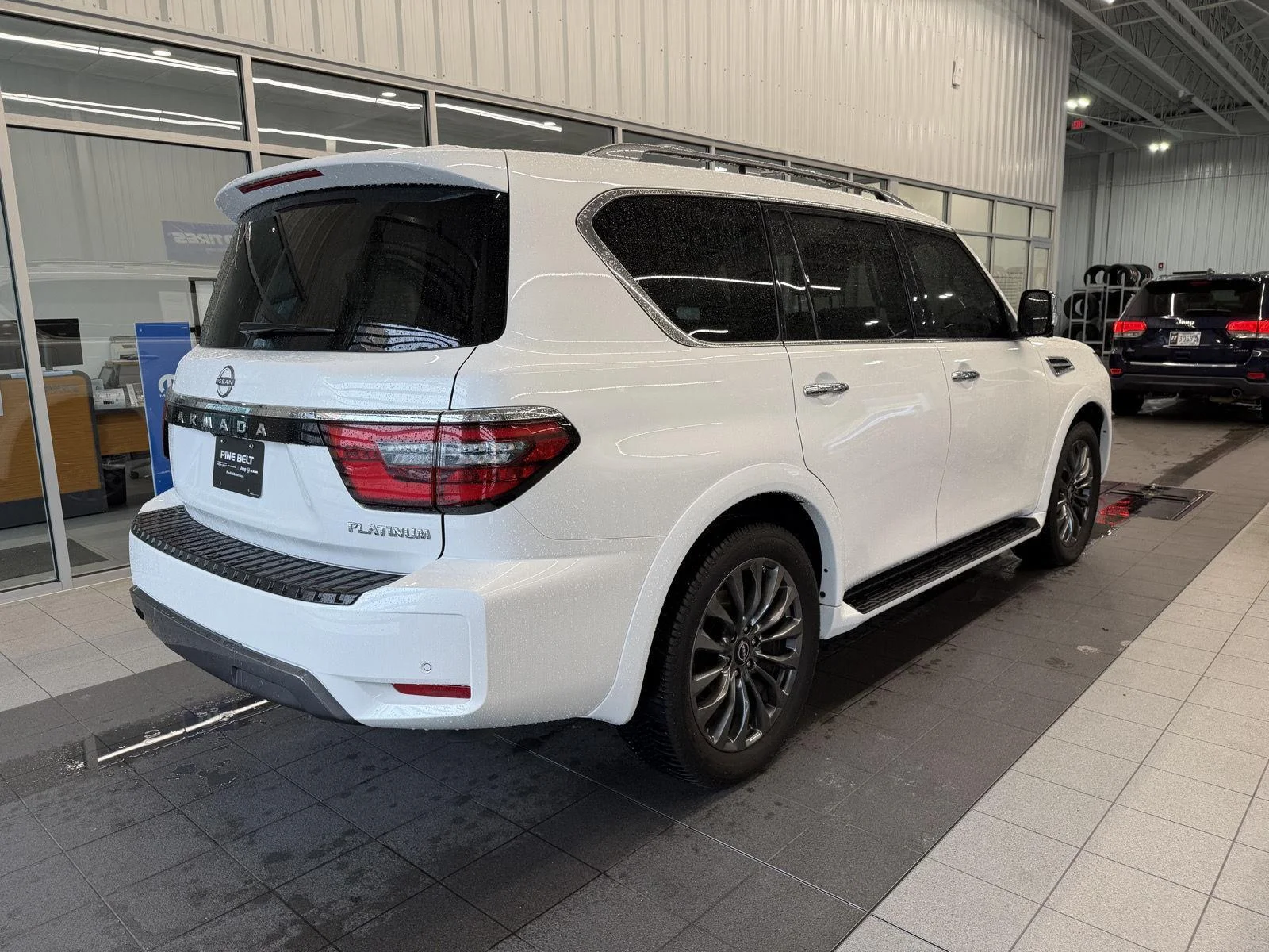 Used 2024 Aspen White Tricoat Nissan Platinum image 6