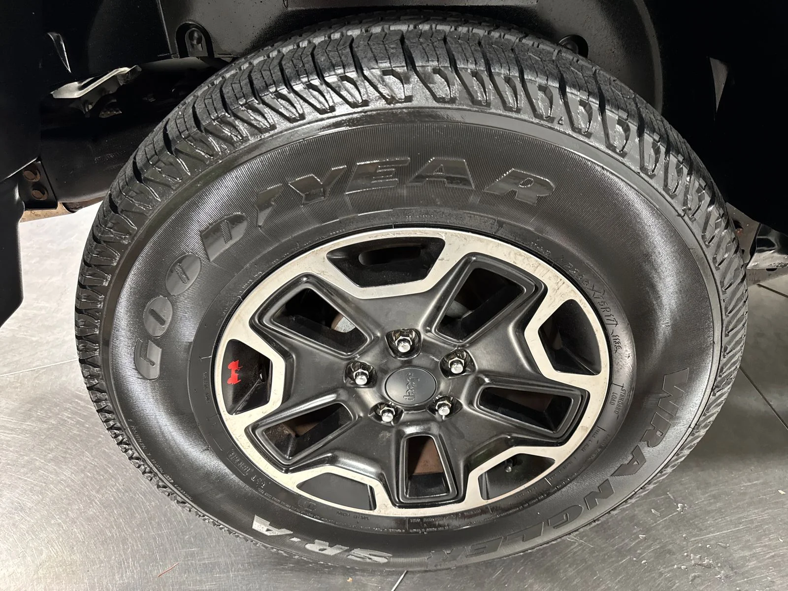 Used 2012 Black / Forest Green Jeep Sport image 13