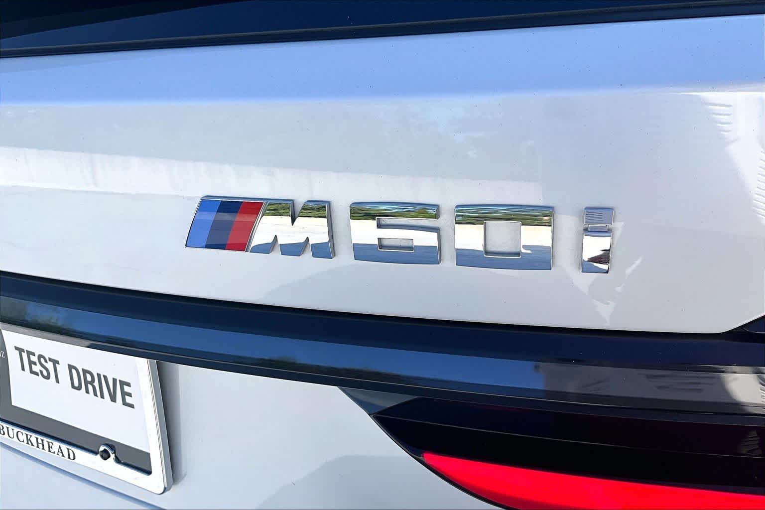 Used 2025 Mineral White Metallic BMW M60i image 10