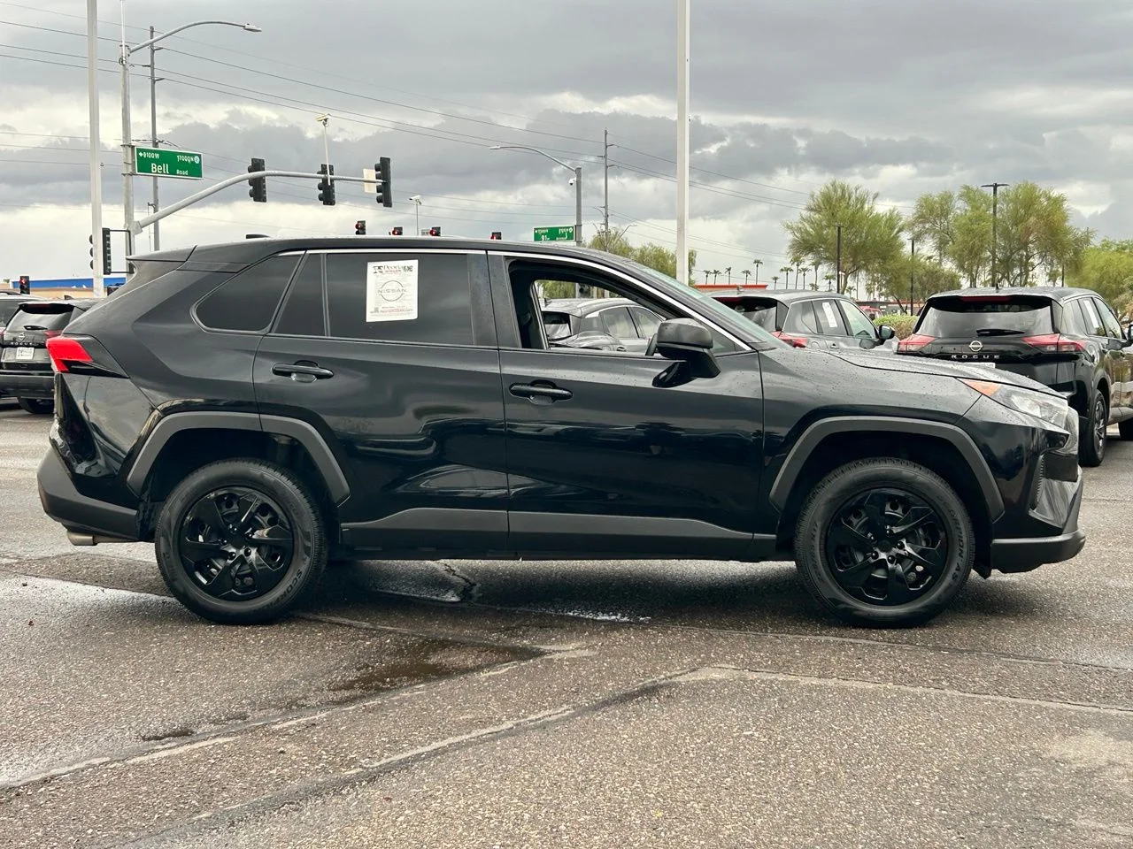 Used 2022 Midnight Black Metallic Toyota LE image 6
