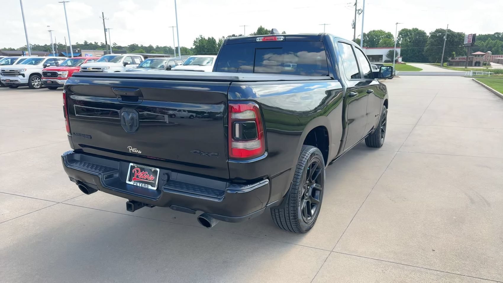 Used 2023 Diamond Black Crystal Pearlcoat Ram Laramie image 7