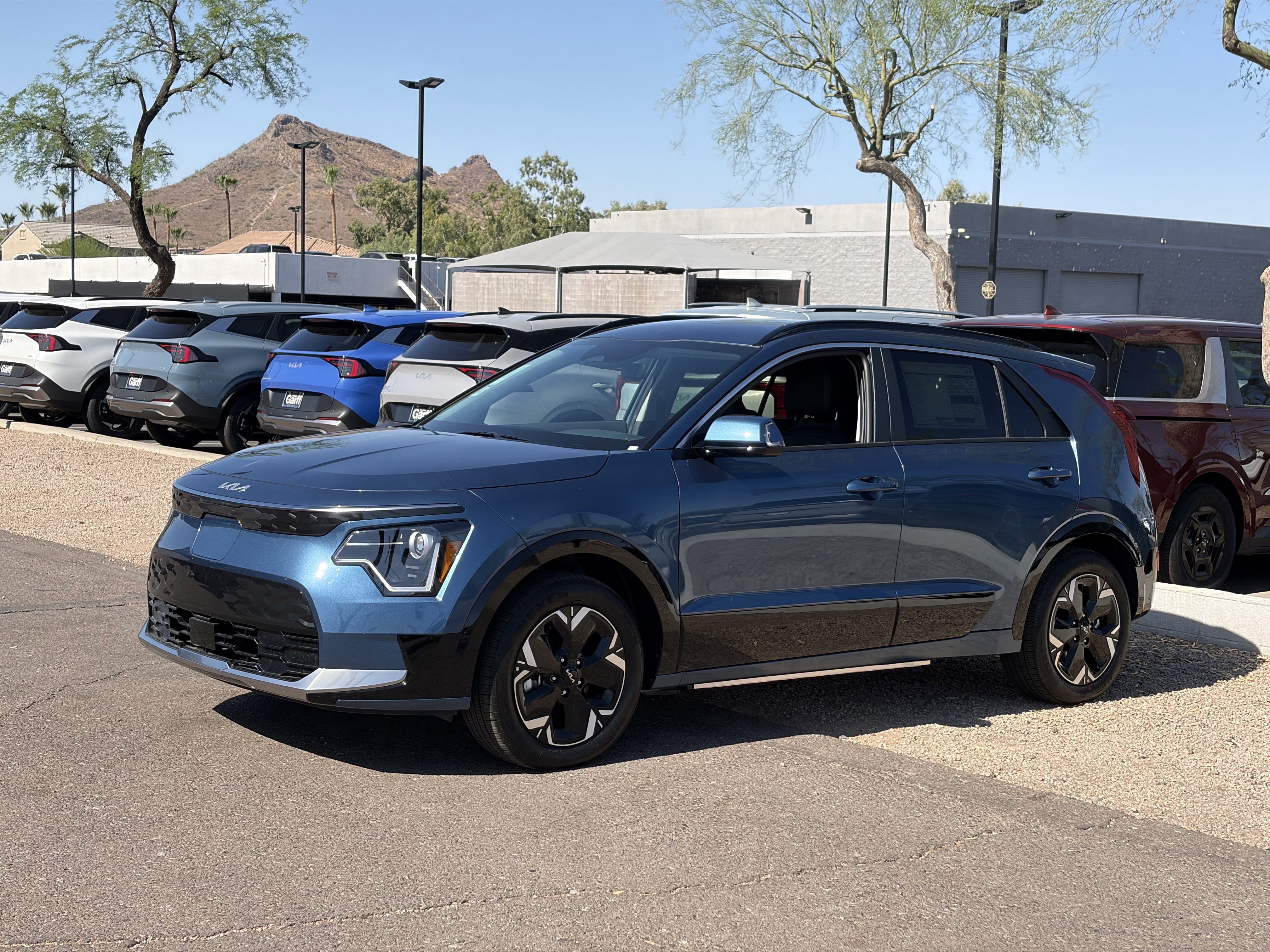 New 2026 Mineral Blue Kia WIND image 6