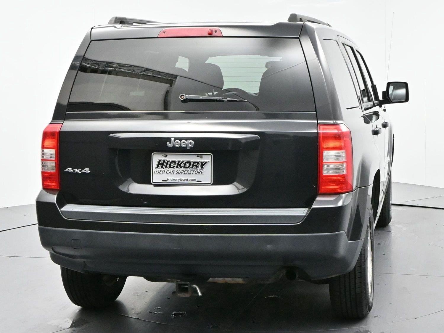 Used 2011 Brilliant Black Crystal Pearl Jeep Sport image 6