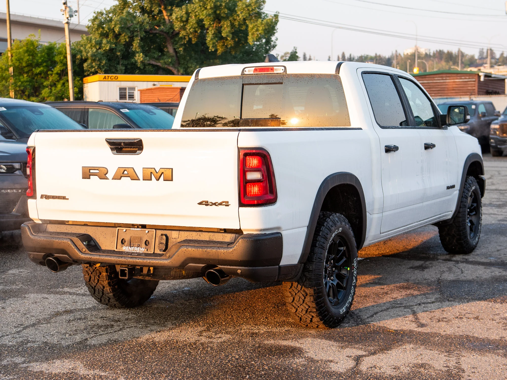 New 2026 White RAM Rebel* Crew Cab 4x4, 33 Inch A/T Tires, Sunroof, Passenger Screen image 7