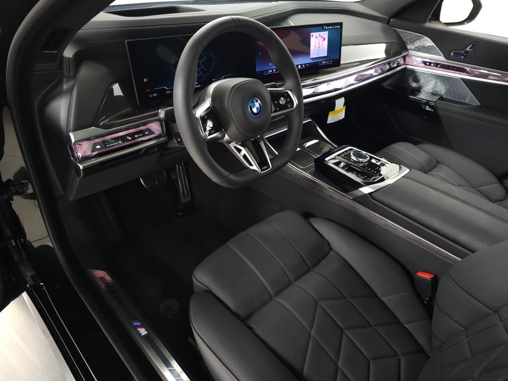 Used 2026 Black Sapphire Metallic BMW xDrive60 image 17