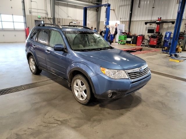 Used 2010 Newport Blue Pearl Subaru 2.5X image 1