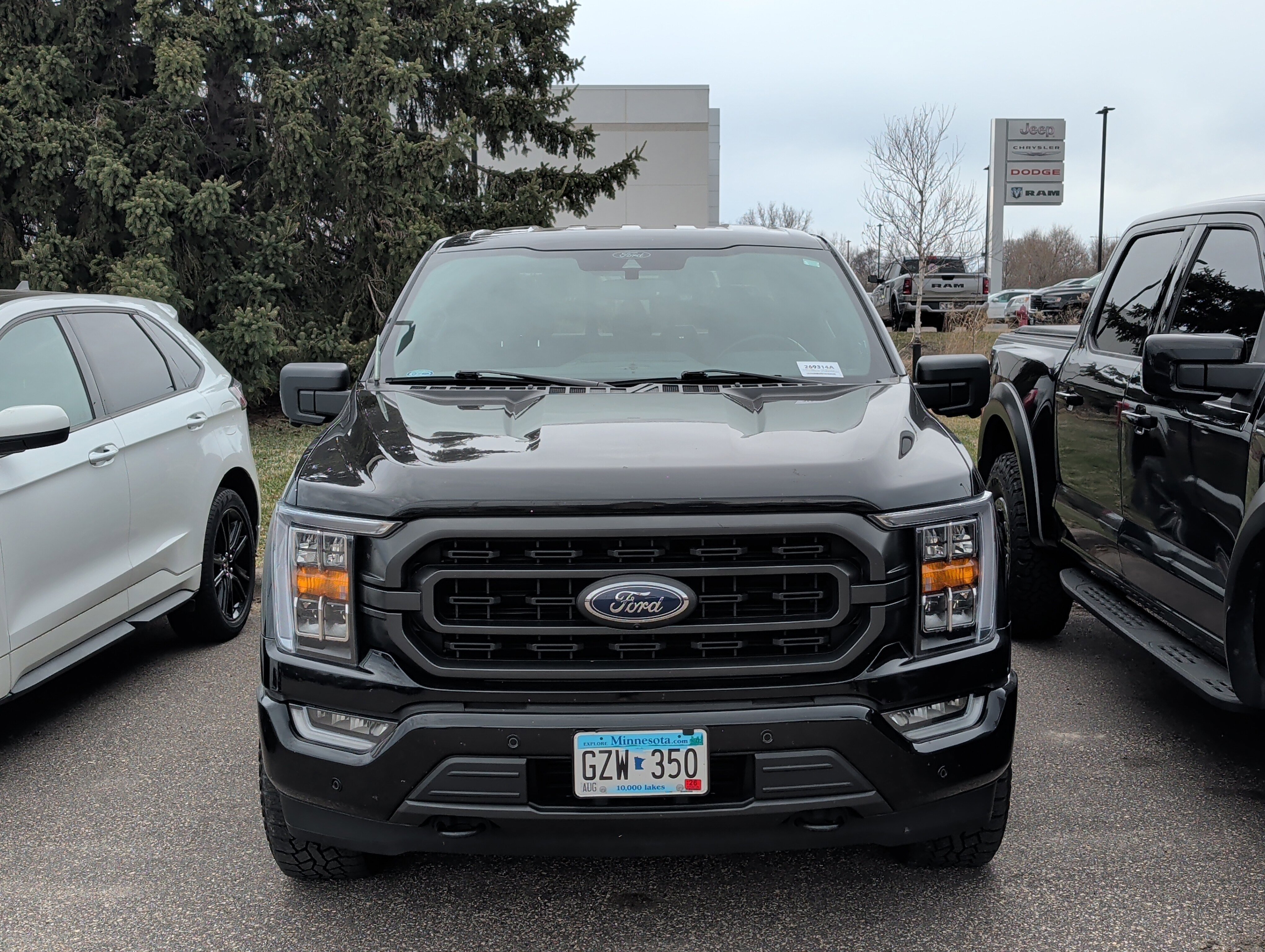 Used 2021 Ford F-150 XLT with VIN 1FTFW1E88MKE41589 for sale in Coon Rapids, Minnesota