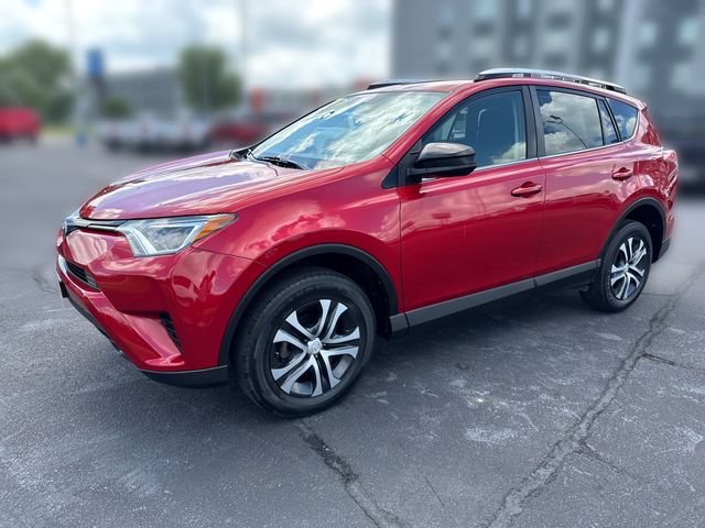 Used 2016 Red Toyota LE image 1