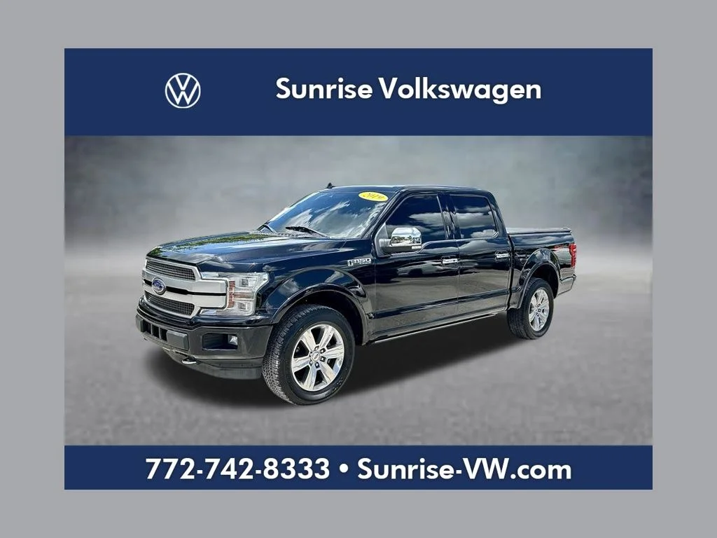 Used 2019 Black Metallic Ford Platinum image 1
