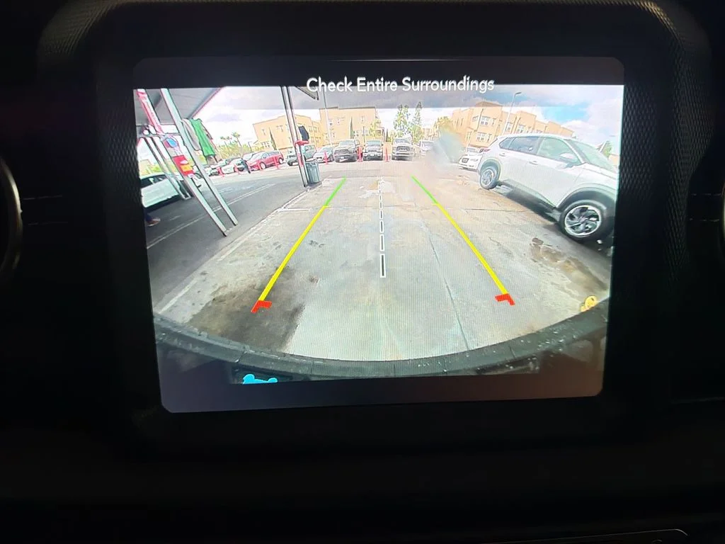 Certified Used 2023 White Jeep Sahara 4xe image 22
