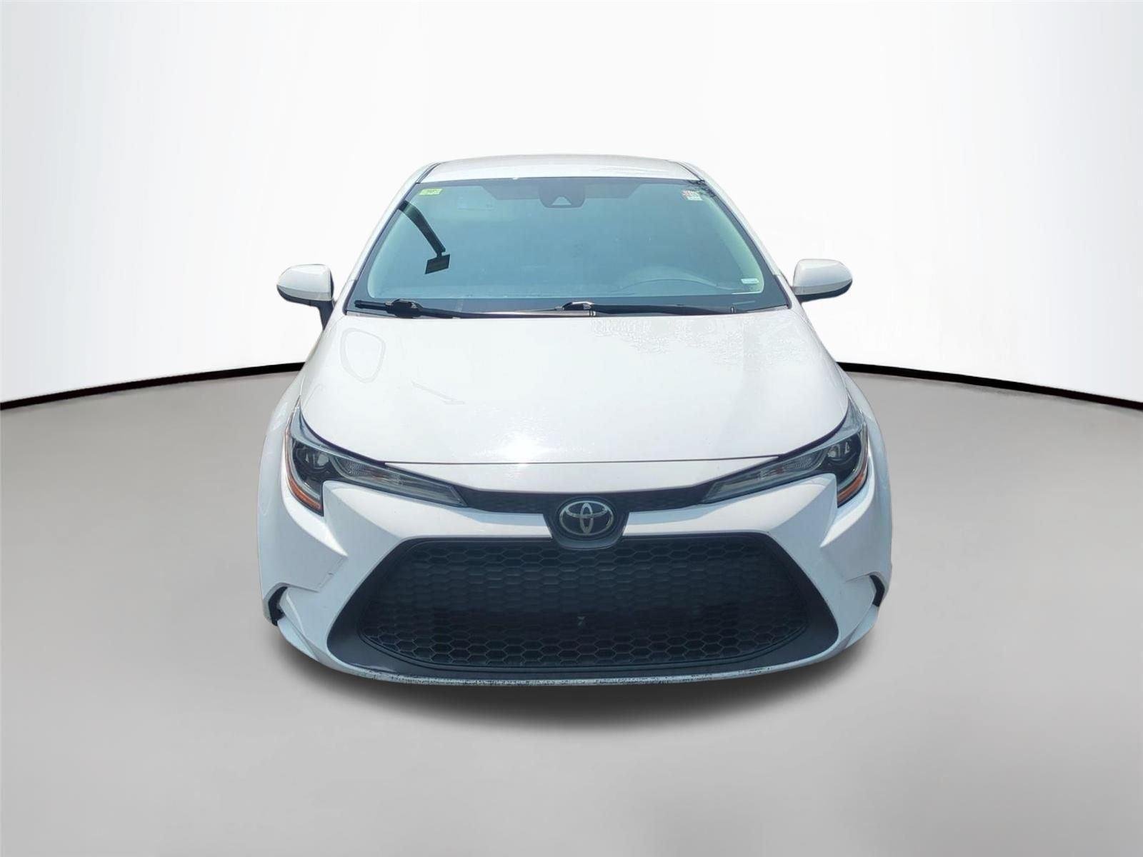 Used 2021 Super White Toyota LE image 2