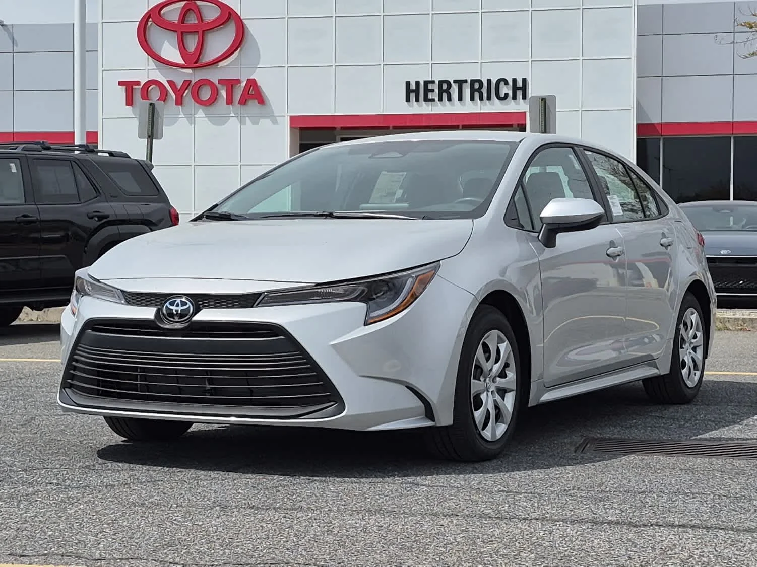 Used 2026 Classic Silver Metallic Toyota LE image 1