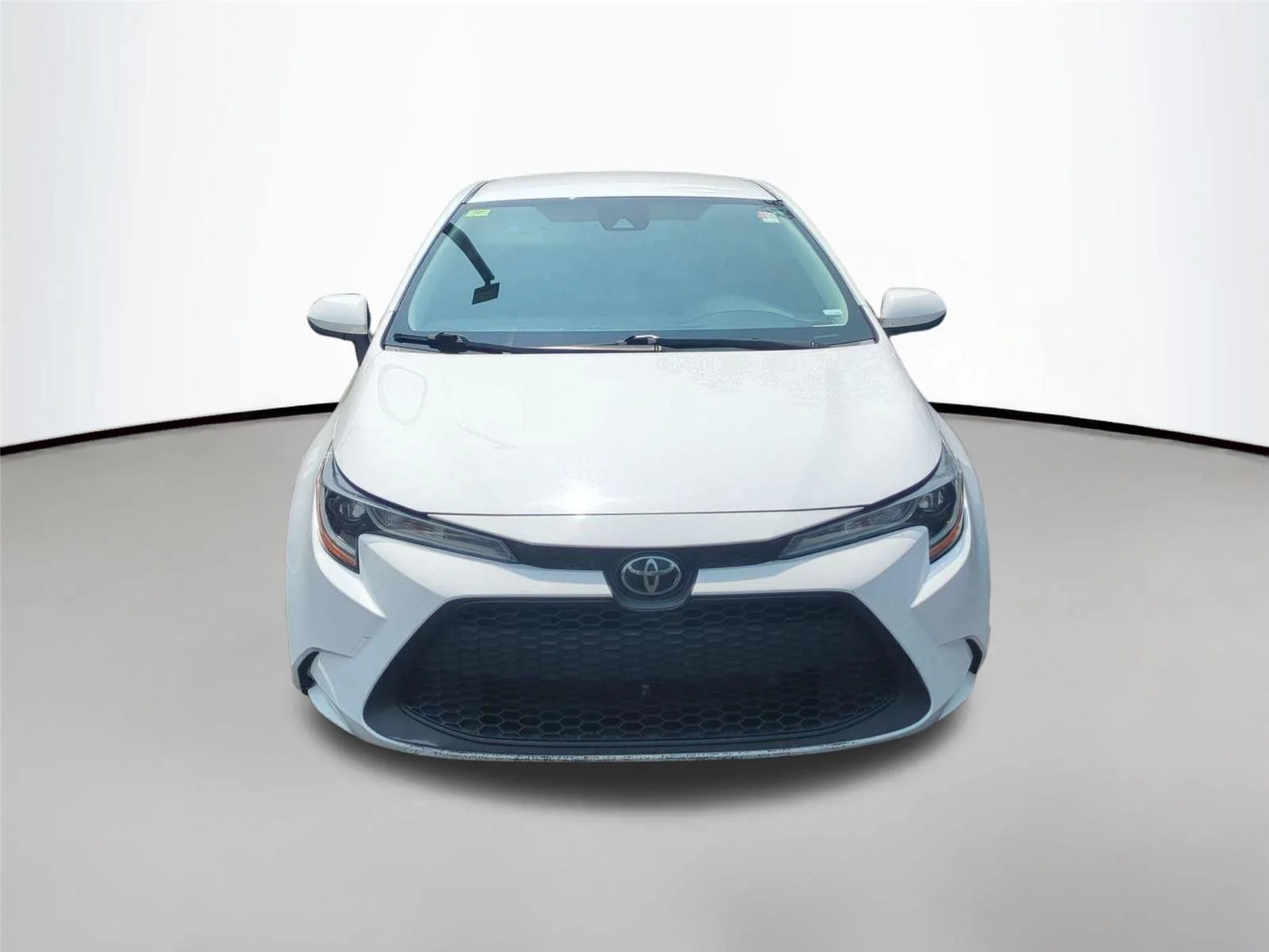 Used 2021 Super White Toyota LE image 2