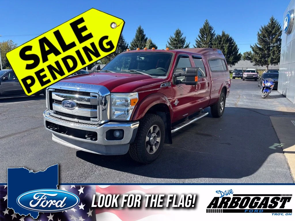 Used 2013 Red Ford Lariat image 1