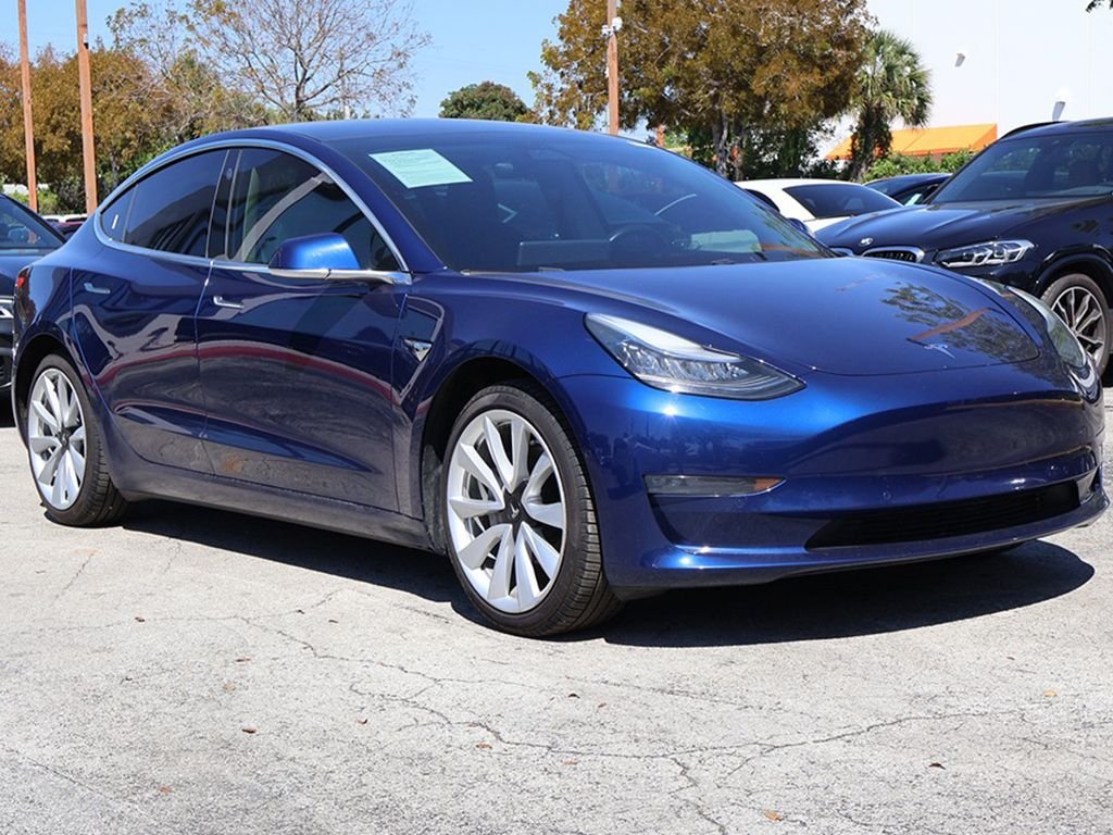 Used 2019 Tesla Model 3 Mid Range with VIN 5YJ3E1EA3KF326966 for sale in Miami, FL