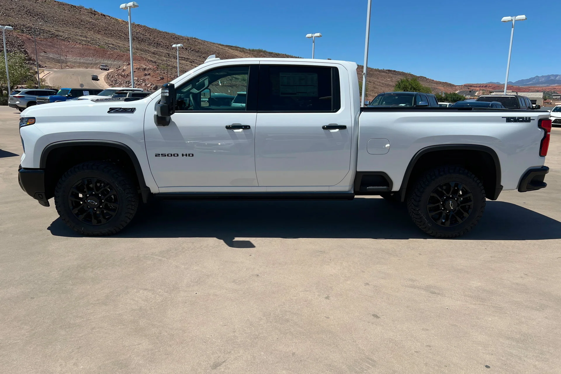 New 2026 Summit White Chevrolet LTZ image 2