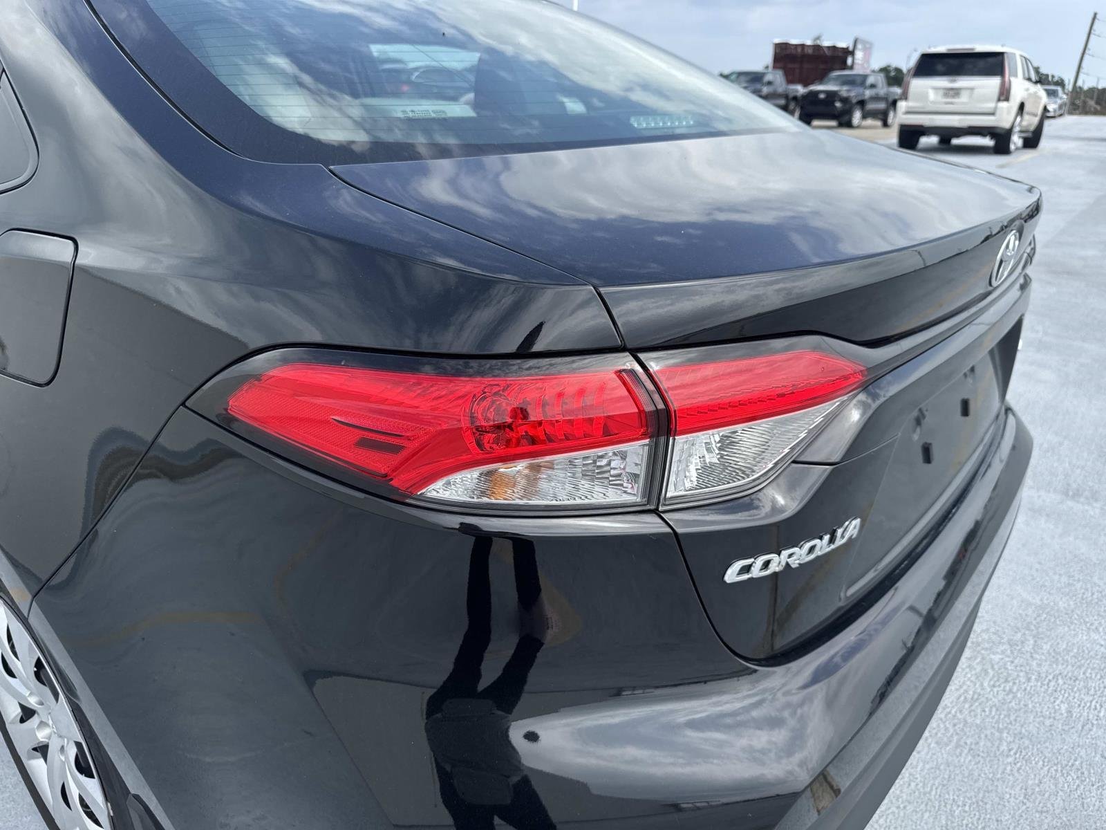 Used 2025 Midnight Black Metallic Toyota LE image 7