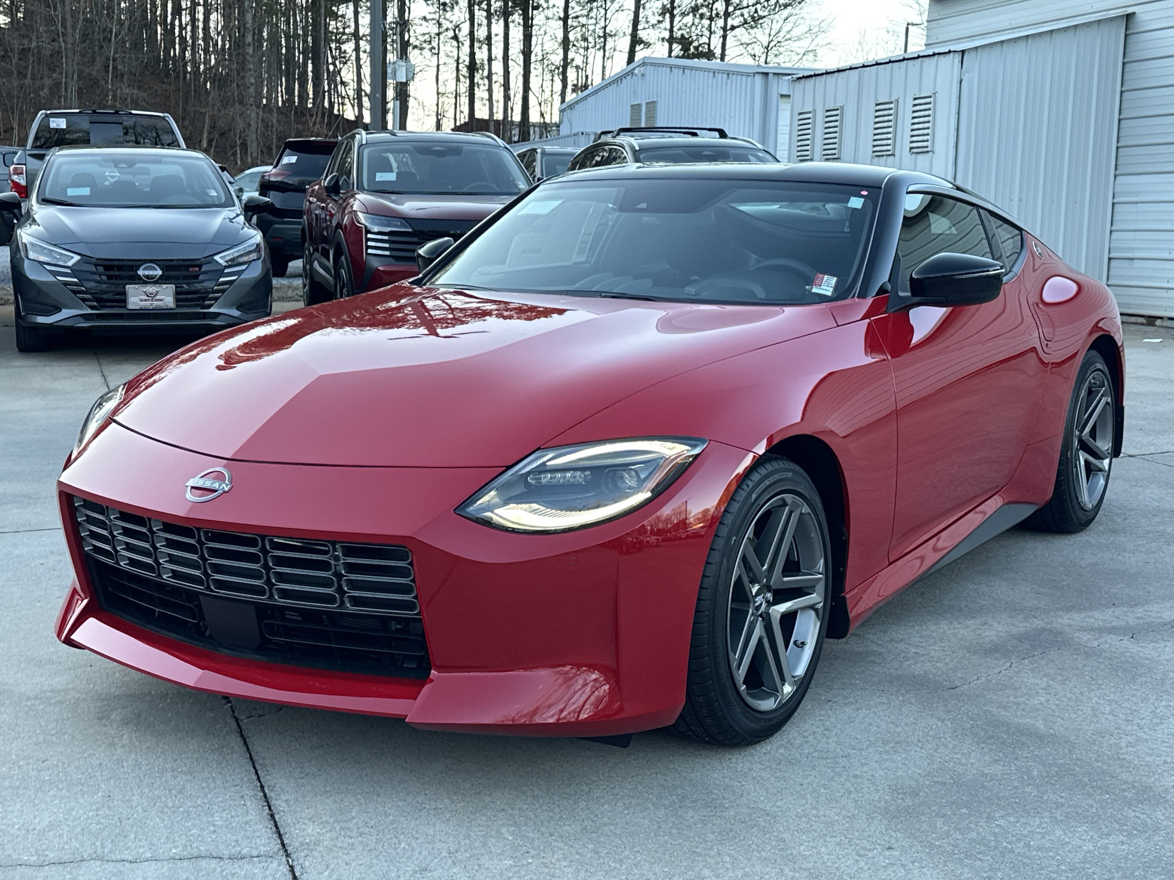 New 2026 Solid Red/Super Black Nissan Sport image 4