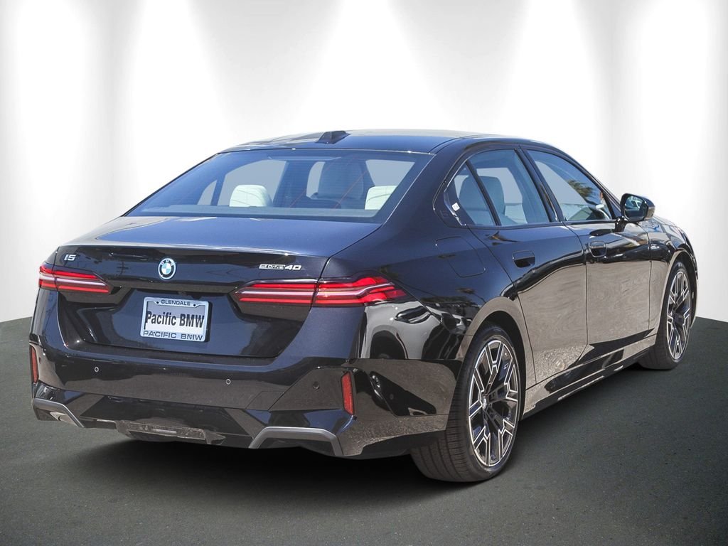 Certified Used 2026 Black Sapphire Metallic BMW eDrive40 image 6