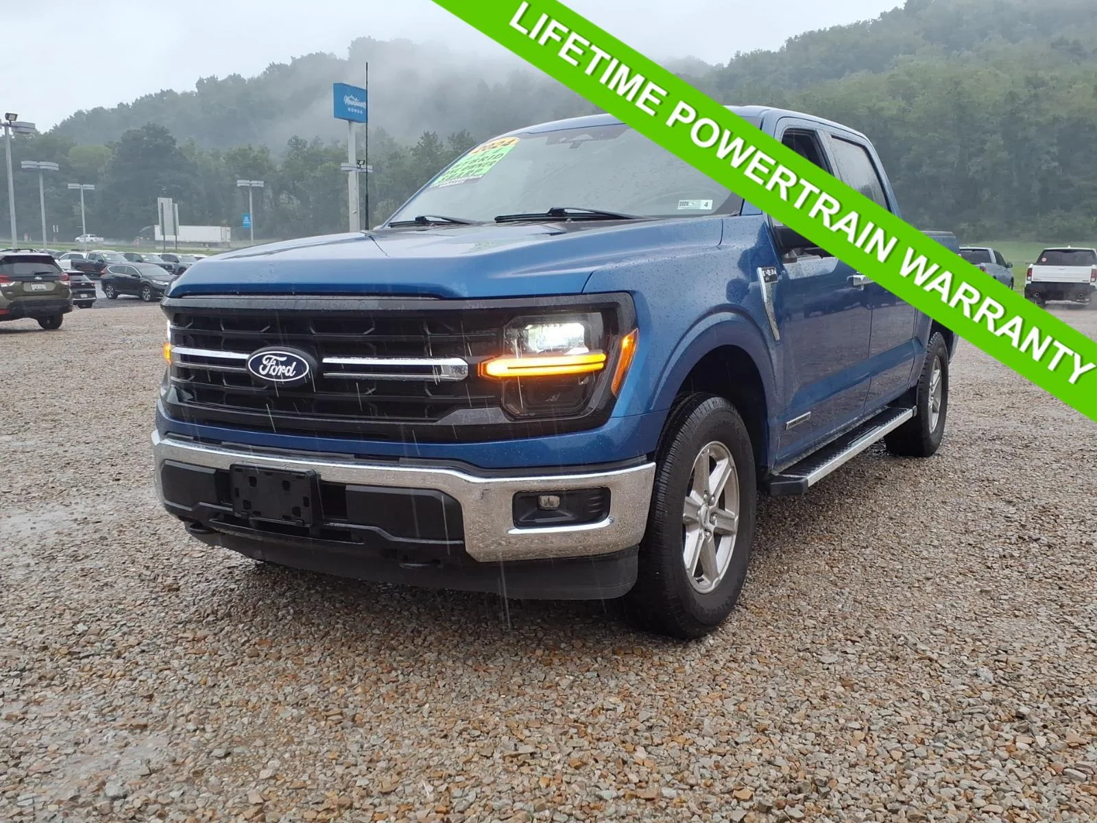 Used 2024 Atlas Blue Ford XLT image 1