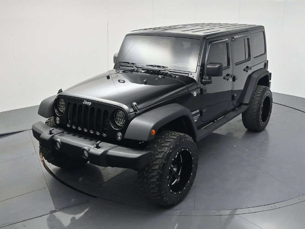 Used 2014 Black Clearcoat Jeep Unlimited Sport image 37