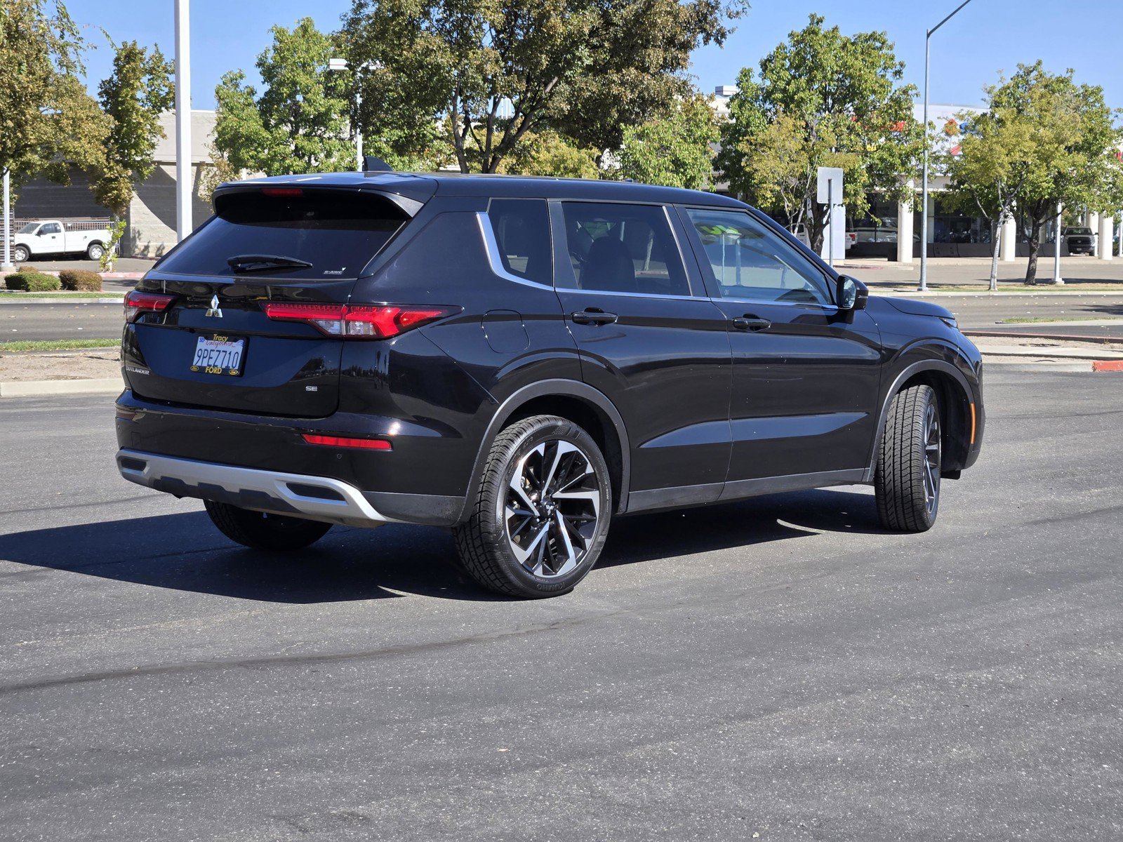 Used 2024 Black Mitsubishi  image 4